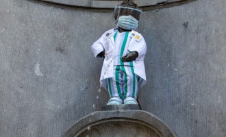 Coronavirus: Bruxellesul îi omagiază pe lucrătorii din sistemul sanitar îmbrăcându-l în medic pe Manneken Pis – Coronavirus